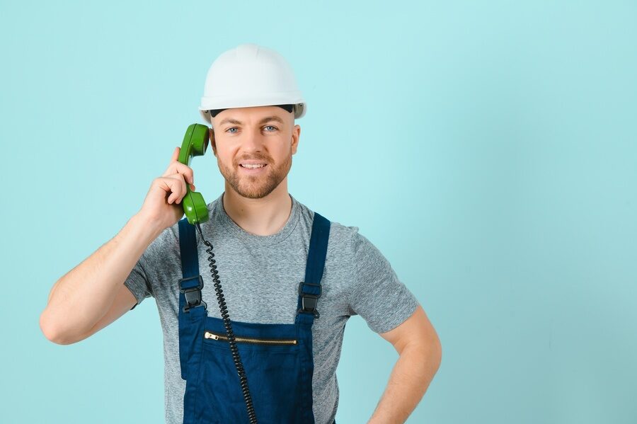 Please call this number, I will assist you. Craftsmen Craftsmen or electrician man with phone isolated background